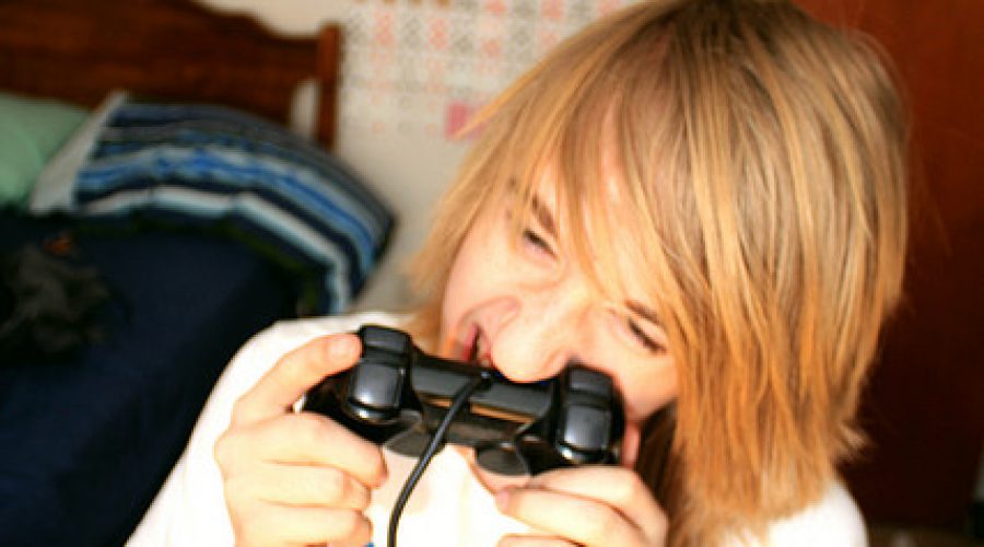 gamer biting a gamepad
